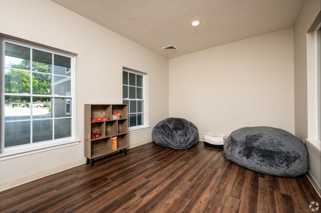 Community lounge in modern apartment building at 120 Flats West Lafayette